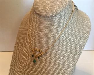 14kt gold necklace & 3 African emeralds.