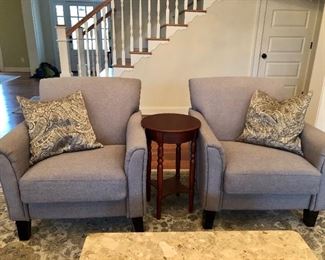 Two matching contemporary chairs, small wood table 