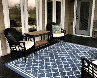Blue Safavich porch rug 8 x 10, rattan and wicker chairs