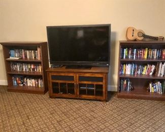Two matching book cases and glass front TV stand, 52" Sony TV, lots of science fiction books!
