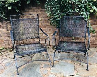 Two heavy metal chairs