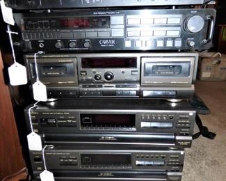 Top: Sansui Audio Mixer, 2nd : Technics Stereo Cassette Deck, 3rd : Carter Sonic Holography PreamplifierTuner, 4th : Technics Compace Disc Changer (5 disc(, 5th : Technics 5 disc CD Changer 6th : Peavy CS-400 Stereo Power Amplifier