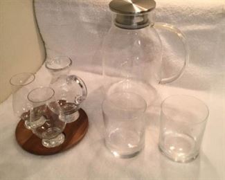 Two Sets of Glass Pitchers and Glasses https://ctbids.com/#!/description/share/306986