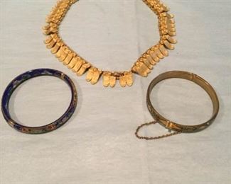 Vintage cloisonné, black and gold bracelets, and gold collar choker necklace https://ctbids.com/#!/description/share/307563