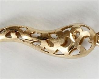 19. 14K Gold Diamond Cut Open Work Italian Horn