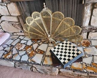 Brass peacock fireplace