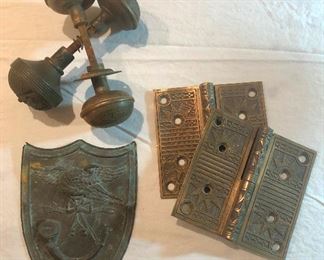 Victorian knobs and hinges, and an early bronze plaque