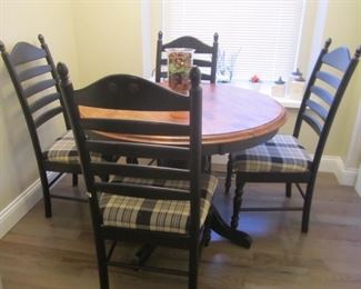 TABLE WITH ONE LEAF 4 SIDE CHAIRS AND 2 ARM CHAIRS IN MINT CONDITION