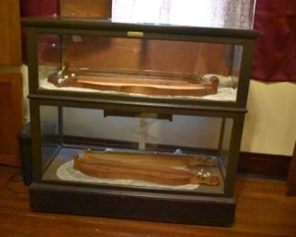 Antique Cigar Store Case with Brass Plate that reads Claes & Lehnreuter Mfg. Co. this case also has slide out drawers in the back. Truly one of a kind! This case is displaying some of the Dulcimers that were hand made by Dr. George Richard Buchanan ;