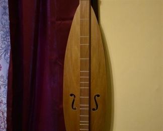 Hand made by Dr. George Richard Buchanan, who also published a book on the making of fine dulcimers, This is a fine example of his work, a Tear Drop Dulcimer made of poplar.