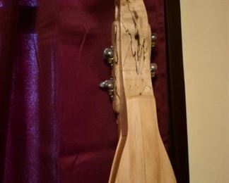 Hand made by Dr. George Richard Buchanan, who also published a book on the making of fine dulcimers, This is a fine example of his work, a Tear Drop  Dulcimer made of poplar.
