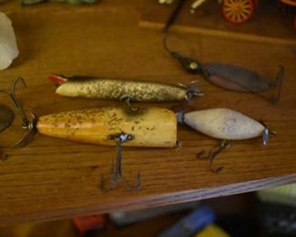 Vintage Fishing Lures, some fishing equipment in the basement including rods and reels.