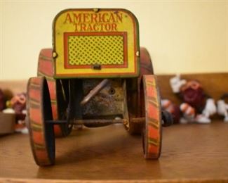 A very rare 1920's Louis Marx & Co. antique tin litho wind-up art deco toy tractor, even the wind-up spring is in great condition with no rust.
