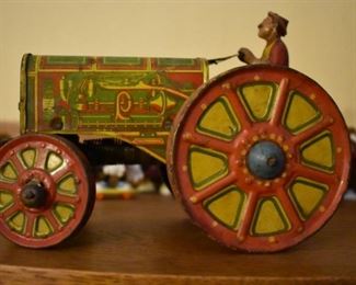 A very rare 1920's Louis Marx & Co. antique tin litho wind-up art deco toy tractor, even the wind-up spring is in great condition with no rust.