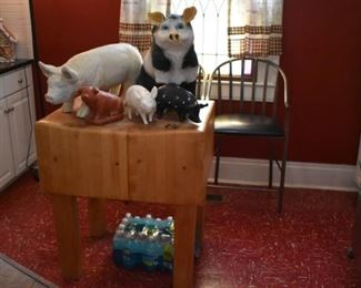 Large Antique Butcher Block in Beautiful Condition! Sitting atop the Block are Antique Chalkware Pigs in various sizes from Large to Medium