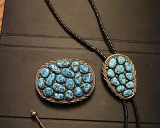 Gorgeous Southwestern Jewelry Featuring this Beautiful Turquoise & Sterling Belt Buckle featuring 18 Turquoise Stones and the Bolo Tie  with 11 Turquoise Stones set in Sterling both pieces are signed by Spencer