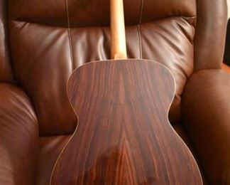 Vintage Fame Acoustic-Electric Guitar 747 Chet Atkins MIJ Japan 1970's w/Hard Shell Dean Case!
designed by Chet Atkins for the program, Famous American Musicians & Educators, as a 747 model made in Japan in the 1970s.  "Natural finish, rosewood back & sides, spruce top, bound mahogany neck with rosewood fingerboard & pearl dot inlays, individual chrome tuners, adjustable rosewood bridge, black pickguard, factory soundhole pickup with Volume & Tone controls." This Guitar is like "Show Room New!"