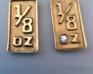 Two 1/8 ounce 14 K pendants https://ctbids.com/#!/description/share/308571