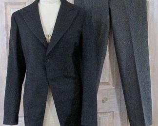 Men's vintage 1940's swallowtail suit coat and pin stripe pants