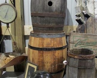 Rustic wood barrels and kegs, old chippy white house architectural trim, antique Hanging Scale