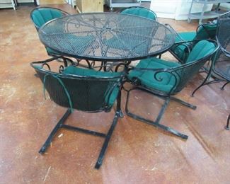 Iron patio table and four chairs