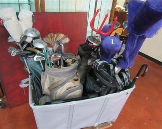 Lots of golf clubs complete sets and misc.