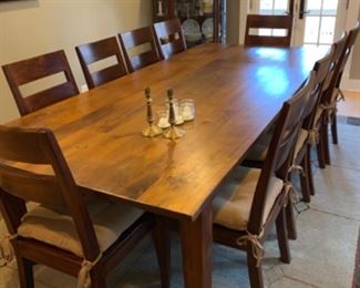 Antique solid wood Barn Table and 8 chairs with neutral cushions.  Great for any home or for a communal table in a café or restaurant.   