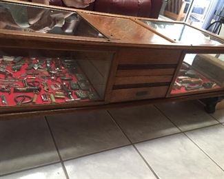 Unique display table with combination locking drawers 