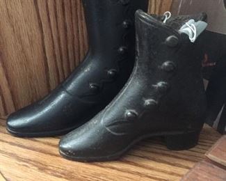 Store advertising cast iron boots