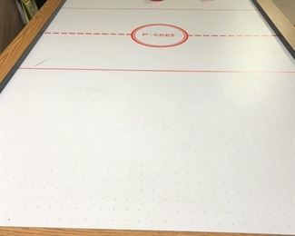 air hockey that turns into a pool table.  Check out the advertisement  photo