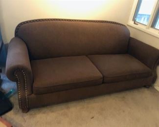 brown two seater sofa