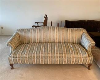 032 Upholstered Camel back sofa