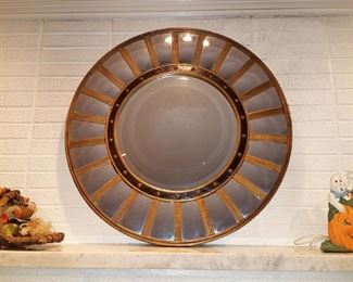 Large round mirror. Very striking!