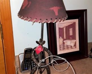 Cowboy lamp made of horse shoes