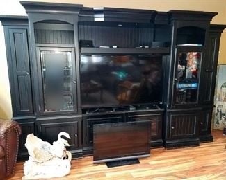 Black entertainment center. Tons of storage. TV not for sale