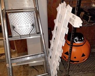 Garage misc. In back - folding bench. painter ladder. Garden trim