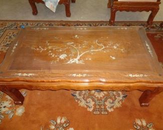 Rosewood w/MOP inlay coffee table and beautiful Orange rug