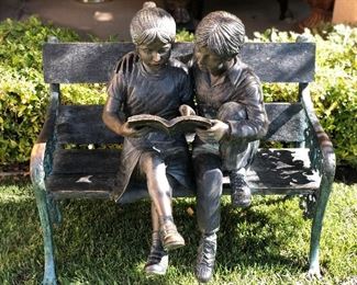 Bronze bench girl and boy 