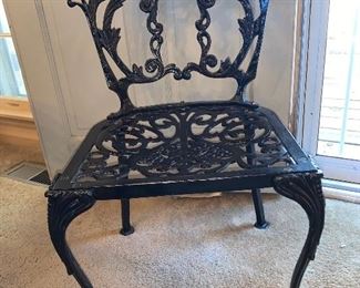 Six wrought iron chairs