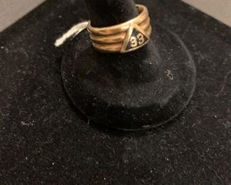 Heavy gold band ring