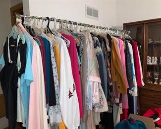 Tons of women and men’s clothing and shoes purses