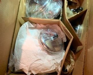On open pots and pans brand new in the box 2 sets