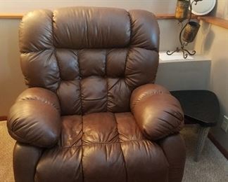 Oversized tufted leather recliner 
