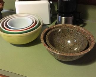 Variety of bowls and small kitchen appliances 