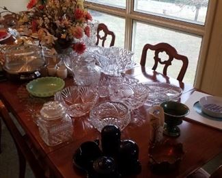 Large scalloped-edge glass platter, Fire-King jadite bowl, cut glass serving bowl, crystal serving bowl-frosted fruit motif, crystal serving bowl-modern shell motif, crystal pear covered jar, divided crystal plate, pressed glass pitcher, blown glass pitcher-Crate & Barrel