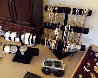 Fossil watches, costume jewelry, sunglasses, wallets
