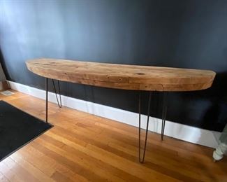 Beautiful handmade console table. Rustic plank top with iron hairpin legs. 