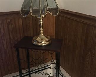 Small wine rack and brass lamp