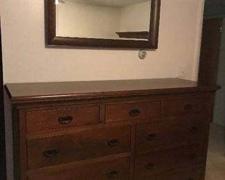 Tall long solid cherry dresser and mirror that goes with the beautiful queen bed. Mint condition.