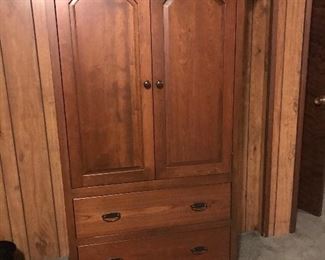 Solid cherry armoire that goes with the bedroom set, however is being sold seperatley.  Could also use for an office/den cabinet